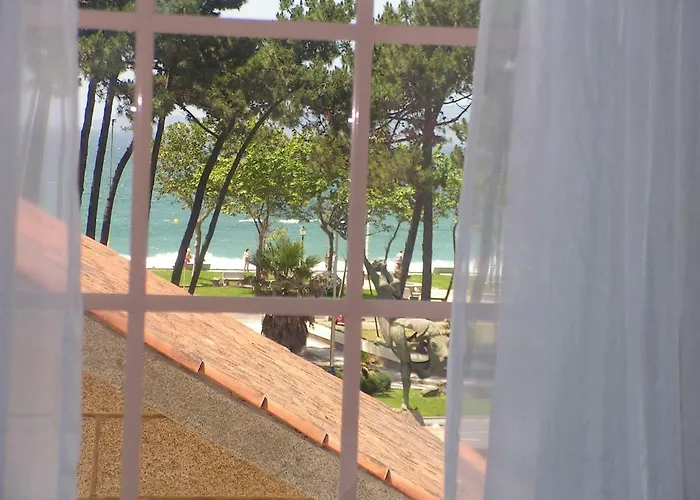 Апартаменты Atico En Playa Samil *